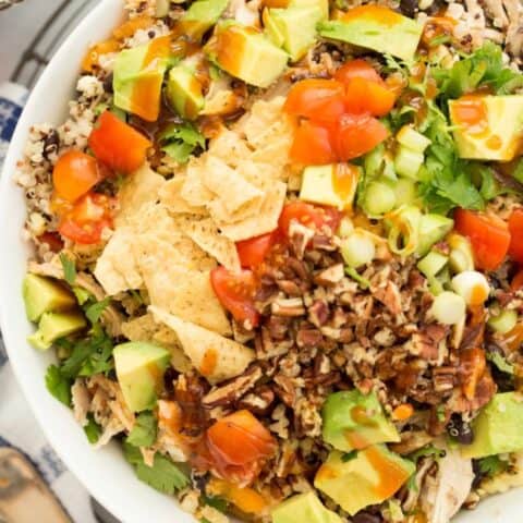 A qhite bowl of Southwest Quinoa Salad