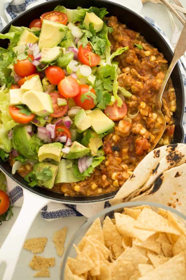 skillet filled with ground turkey and refried beans