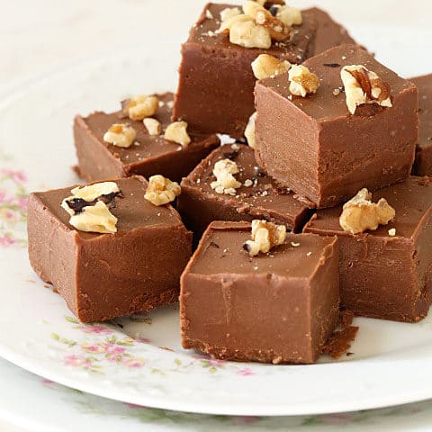 A white plate filled with Chocolate Peanut Butter Fudge.