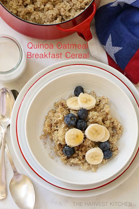 A white bowl of hot oatmeal and quinoa cereal.