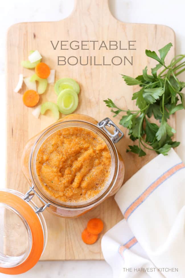 A clear glass mason jar filled with homemade vegetable bouillon.