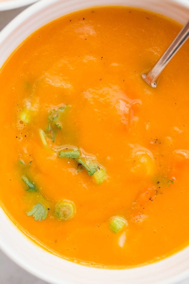 This Carrot Ginger Soup Recipe is made with carrots, celery, onion, ginger and garlic all simmered in a vegetable broth, then blended until smooth and silky