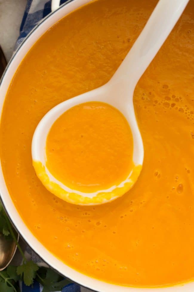 This Carrot Ginger Soup Recipe is made with carrots, celery, onion, ginger and garlic all simmered in a vegetable broth, then blended until smooth and silky