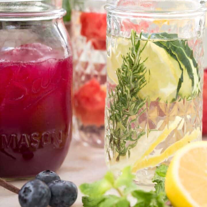 Two glasses with water and fruit for flavored water.