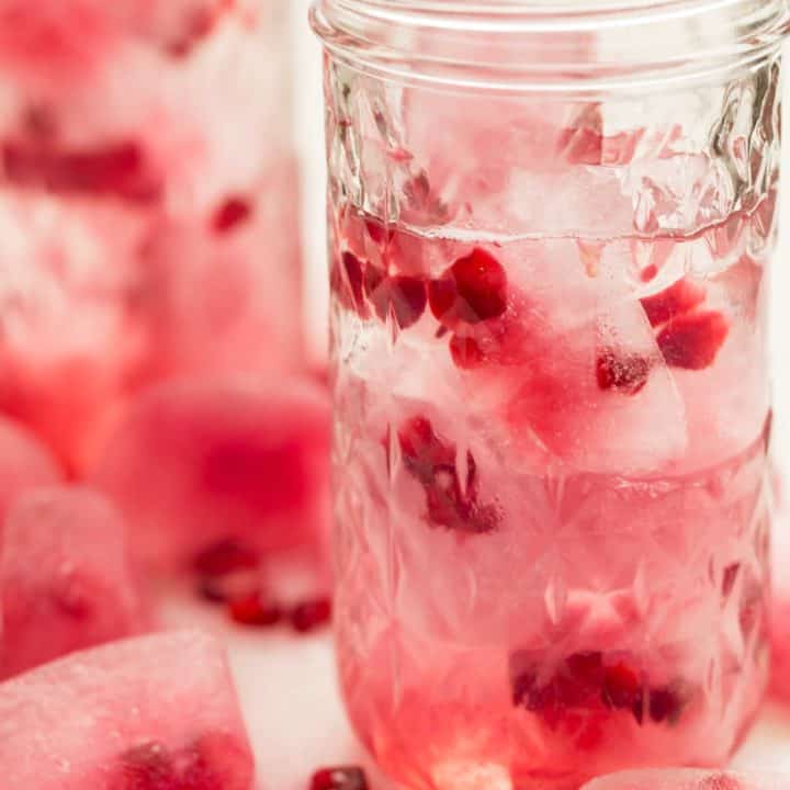 This Pomegranate Water is made with fruit infused ice cubes made with fresh pomegranate seeds and fresh pomegranate juice