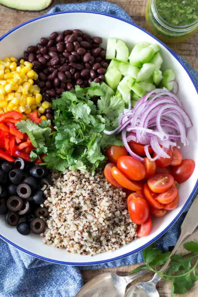 bowl of salad ingredients - is quinoa healthy