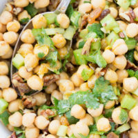 This Curried Chickpea Salad is a simple salad made with garbanzo beans, raisins, pecans, parsley and celery all tossed in a delicious curry salad dressing