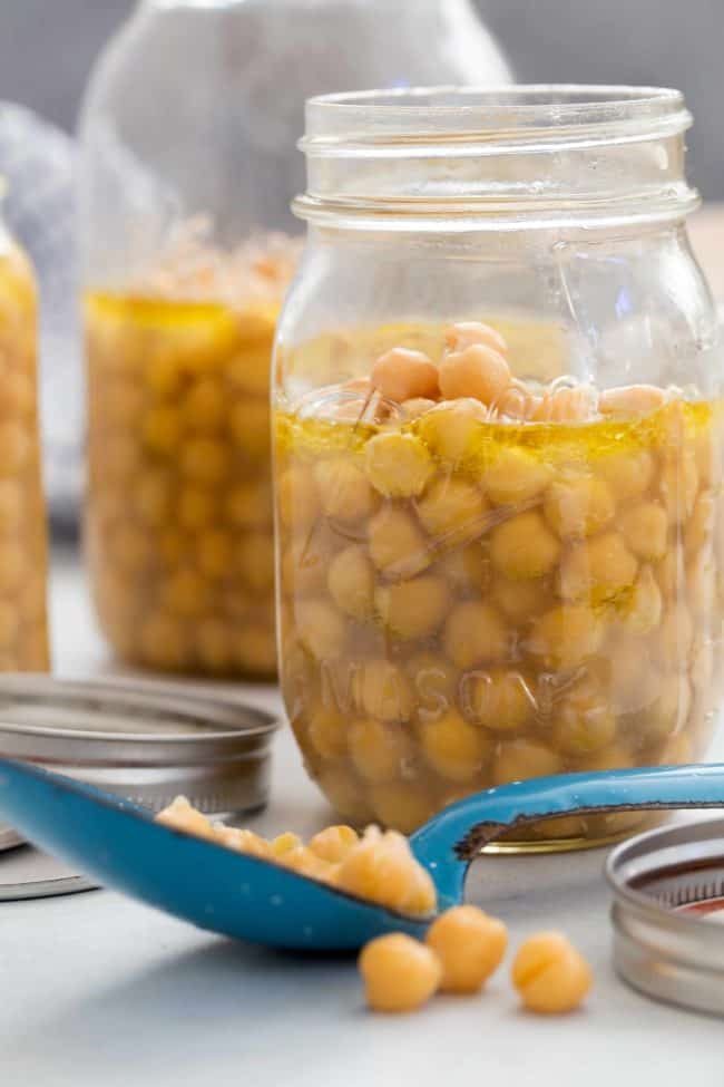 mason jars filled with cooked chickpeas