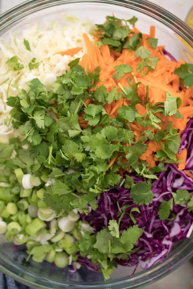 bowl of shredded cabbage for easy coleslaw recipe