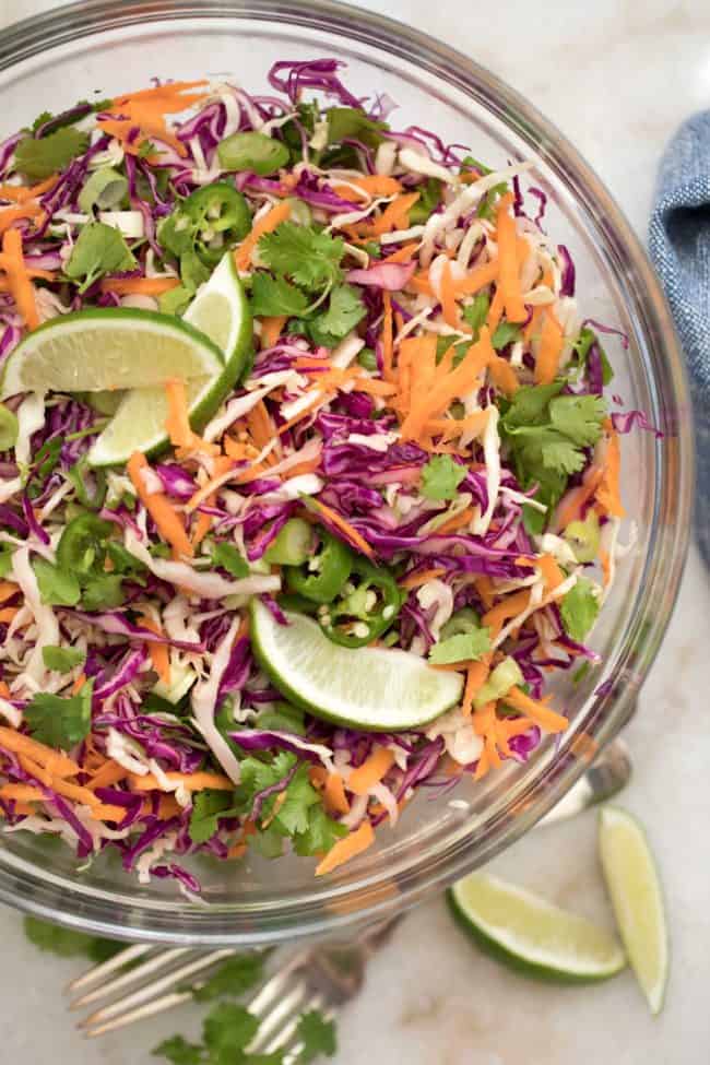 bowl of shredded cabbage for healthy coleslaw recipe