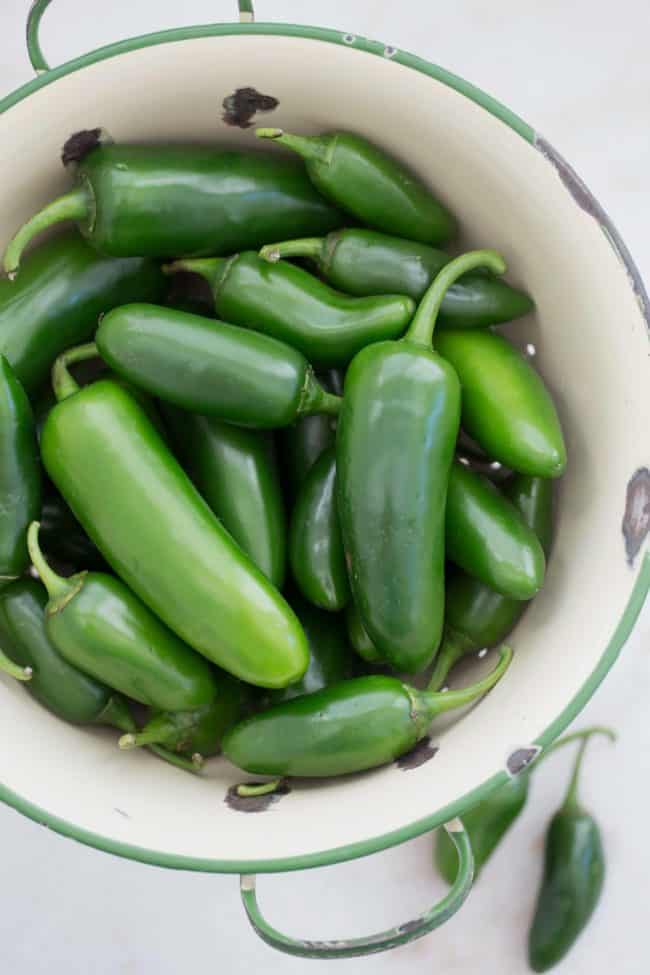 These slightly spicy Pickled Jalapenos are quick and easy to make and they're great to add to tacos, nachos, burgers and more