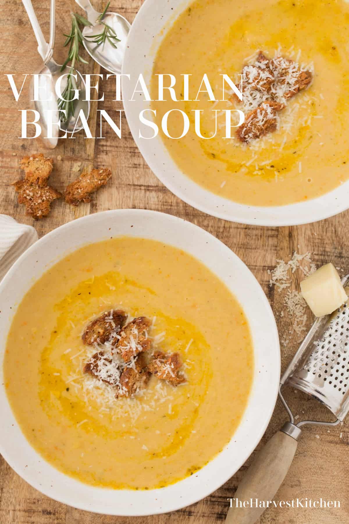 Two white bowls filled with Vegetarian Bean Soup.