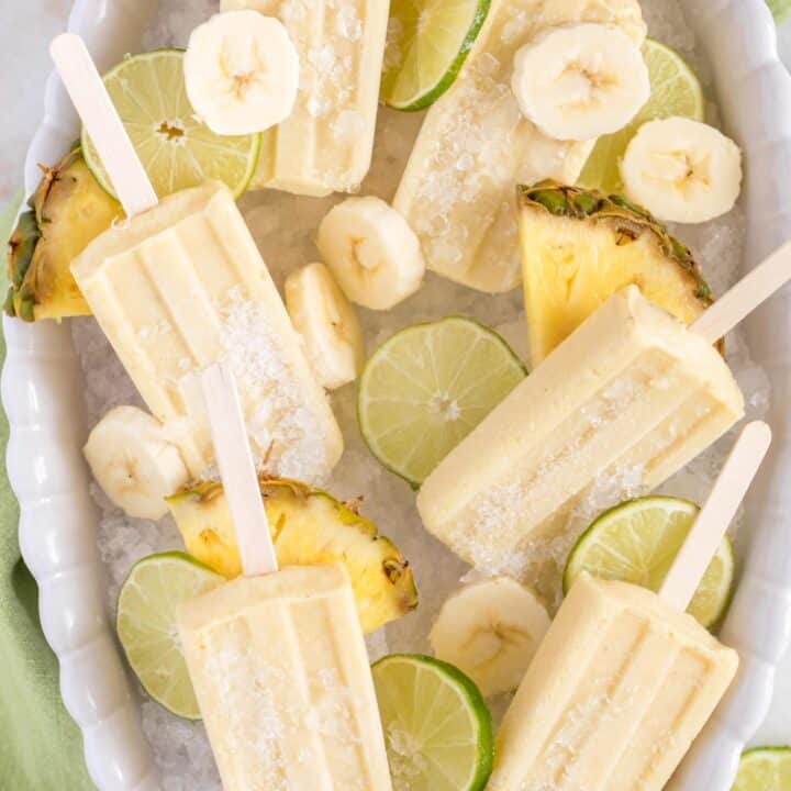 These easy-to-make Pineapple Banana Popsicles are made with fresh bananas, pineapple, pineapple juice and coconut milk