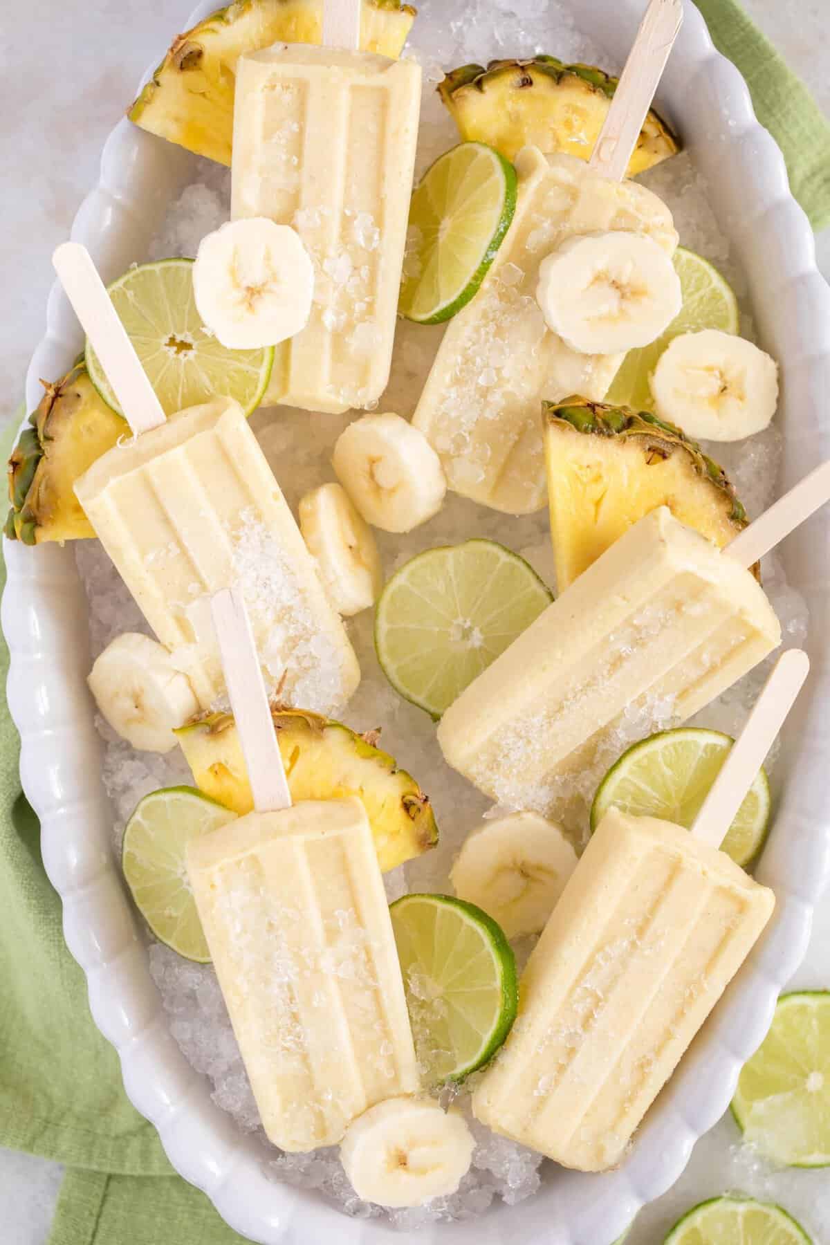 These easy-to-make Pineapple Banana Popsicles are made with fresh bananas, pineapple, pineapple juice and coconut milk