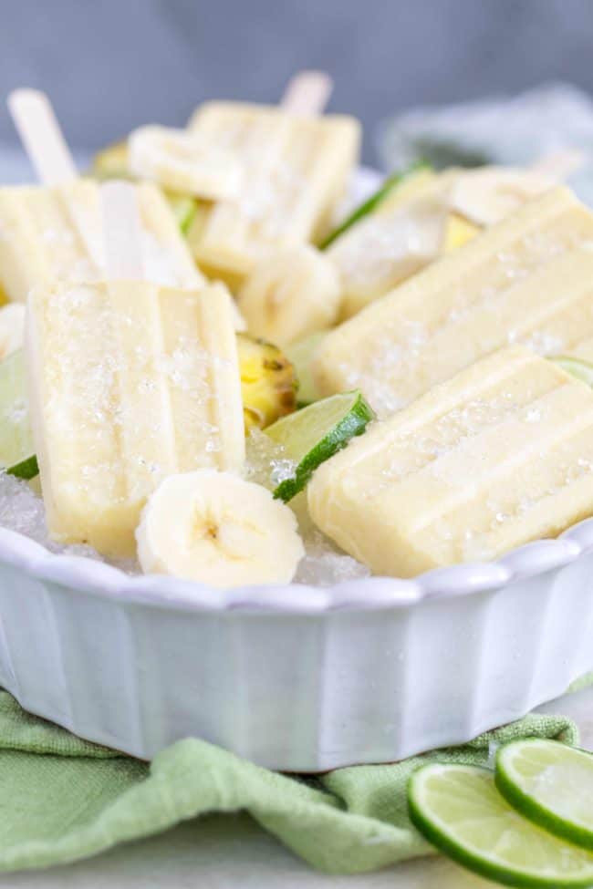 These easy-to-make Pineapple Banana Popsicles are made with fresh bananas, pineapple, pineapple juice and coconut milk