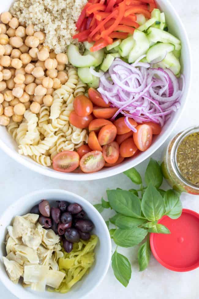 bowls of pasta salad ingredients