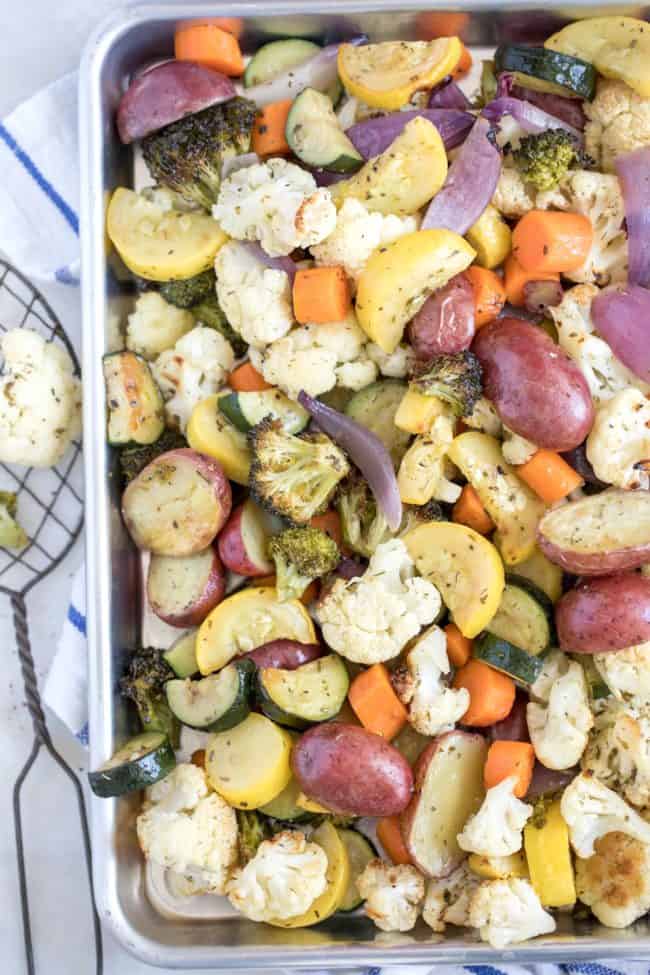 A cookie sheet filled with roasted vegetables