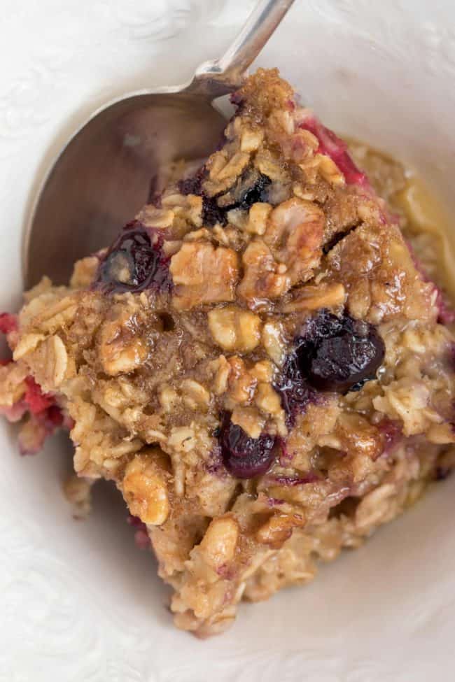 This Baked Oatmeal is studded with a mix of berries and naturally sweetened with frozen bananas and pure maple syrup