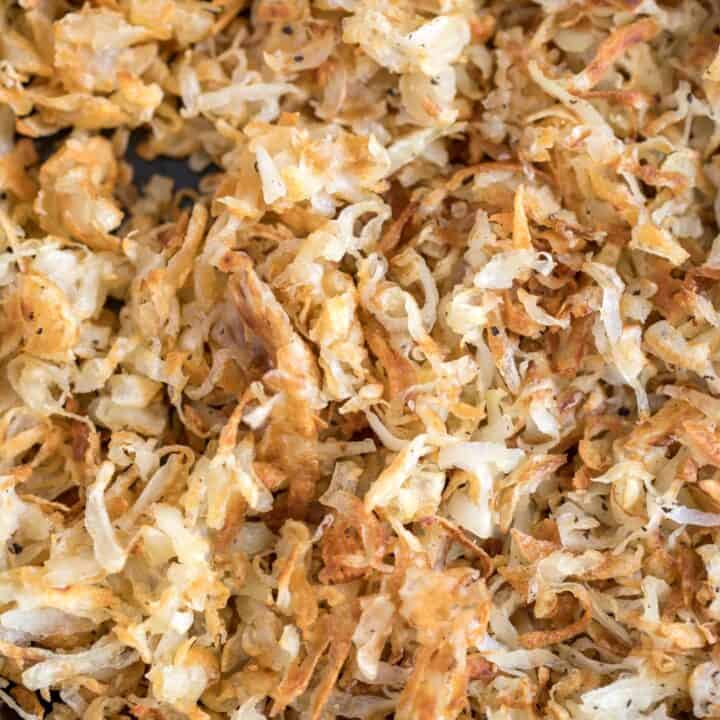 A skillet filled with homemade hash browns.