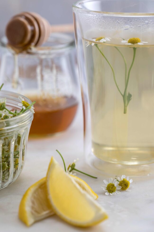 glass mug of chamomile tea