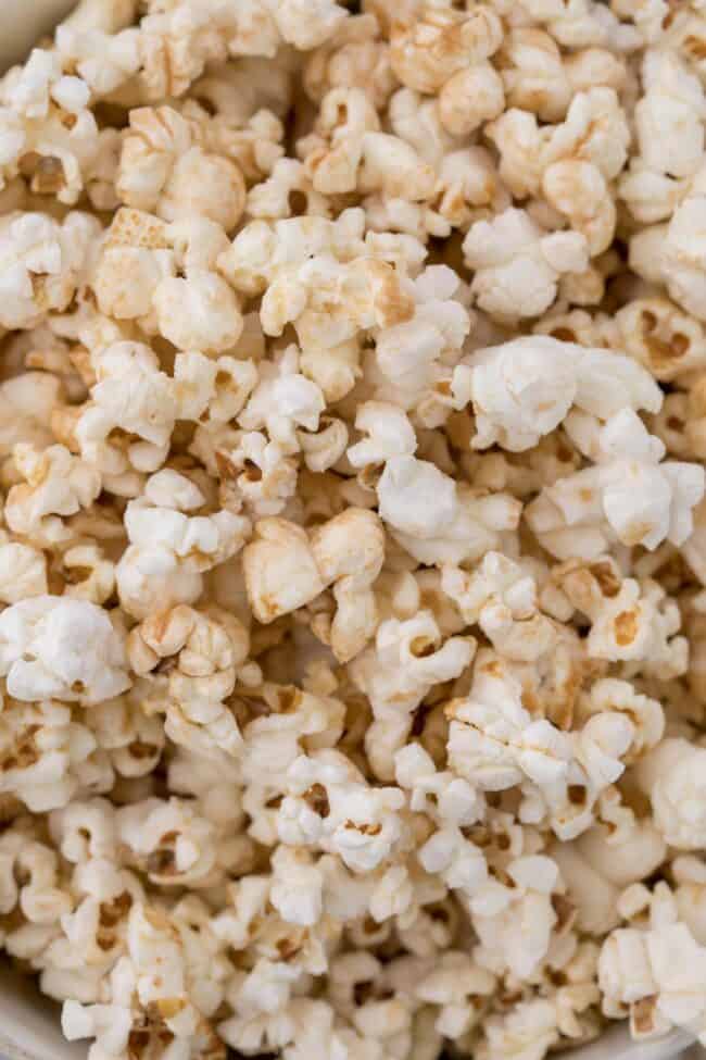 A white bowl filled with homemade kettle corn.