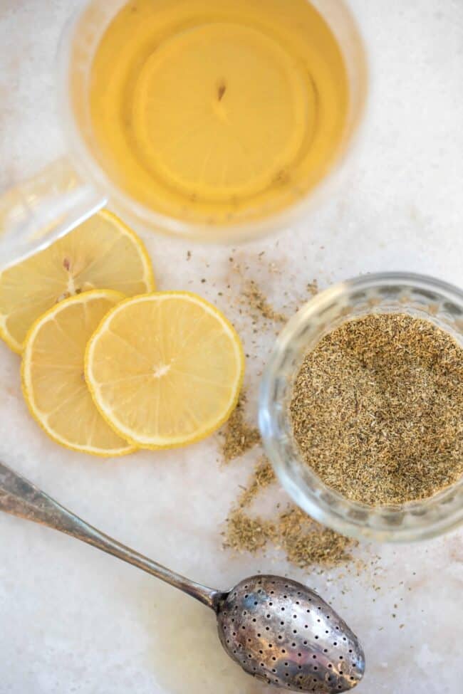 dried chamomile and cup of chamomile tea