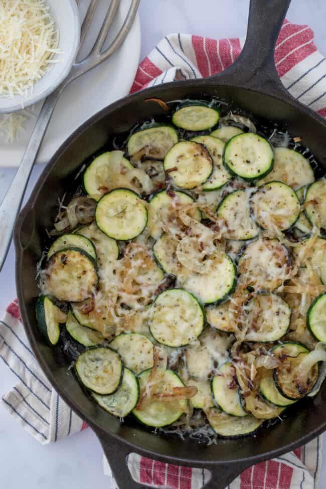 skillet of sauteed onions and zucchini