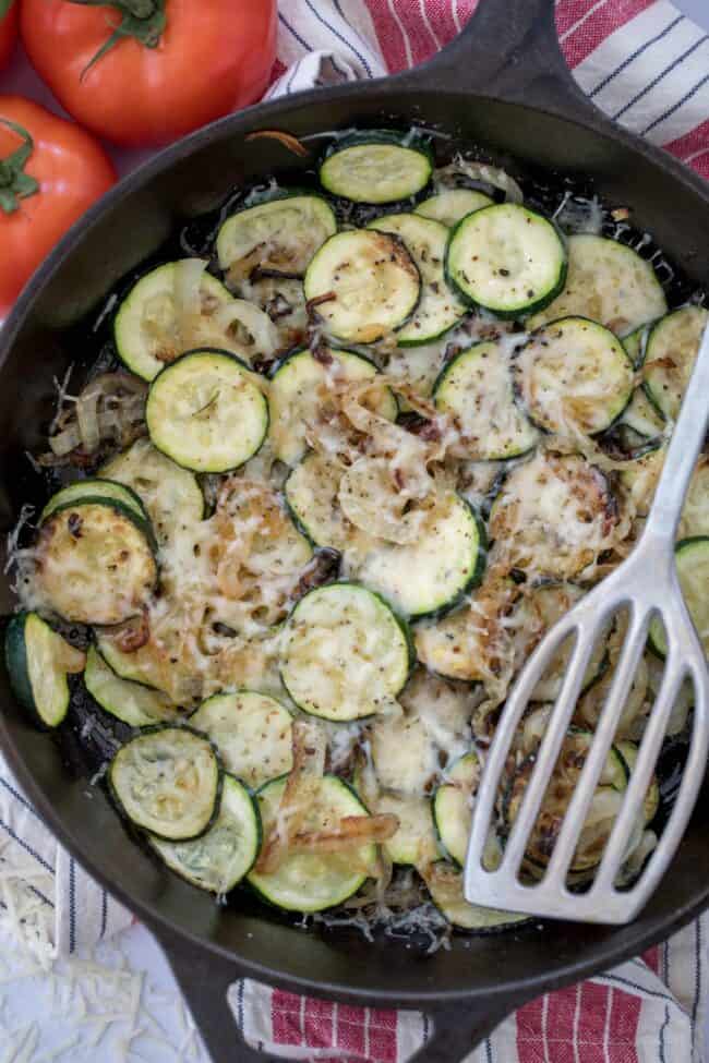 skillet of sauteed zucchini and onions for zucchini side dish