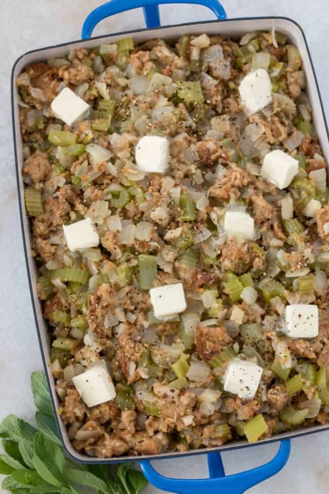 Blue baking dish filled with a casserole