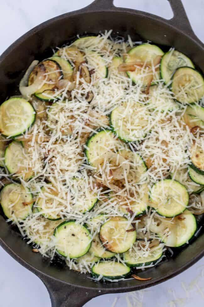 skillet of sauteed zucchini and onions for zucchini side dish