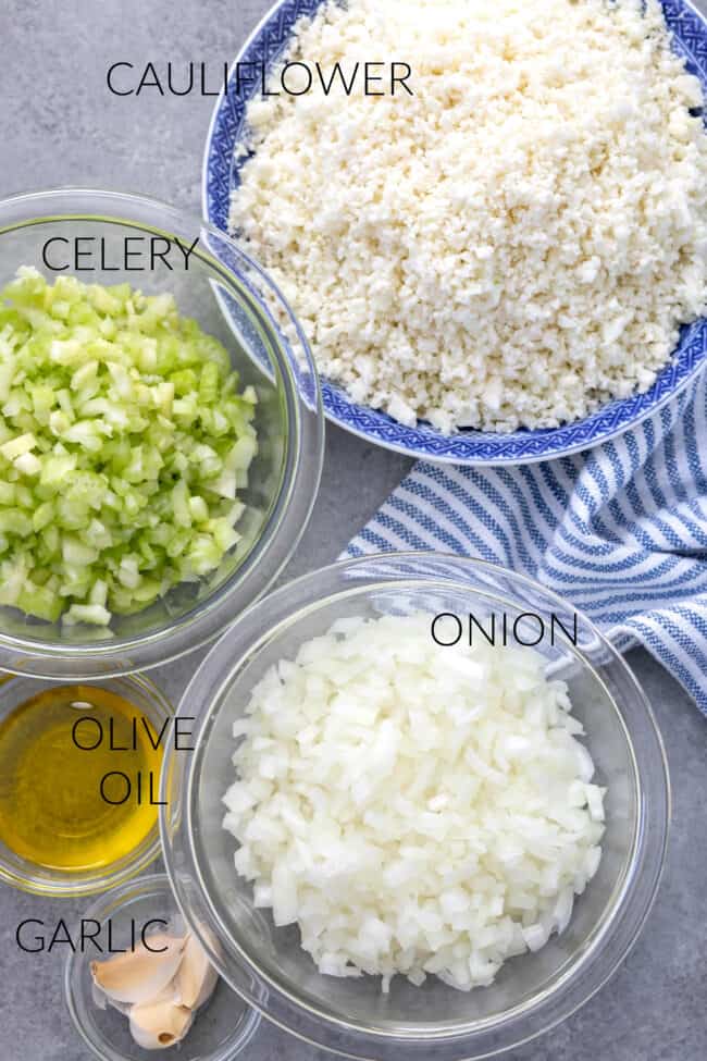 Clear glass bowls filled with cut vegetables.