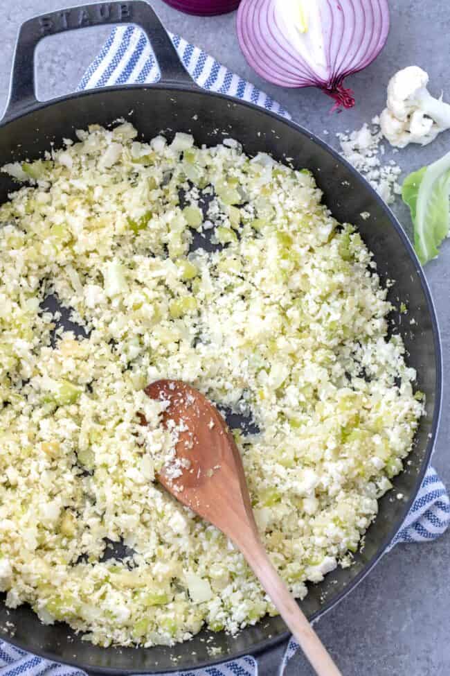 A skillet filled with cauliflower rice.