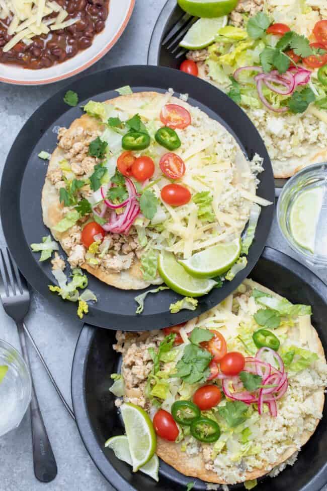 plates with ground chicken and tortillas