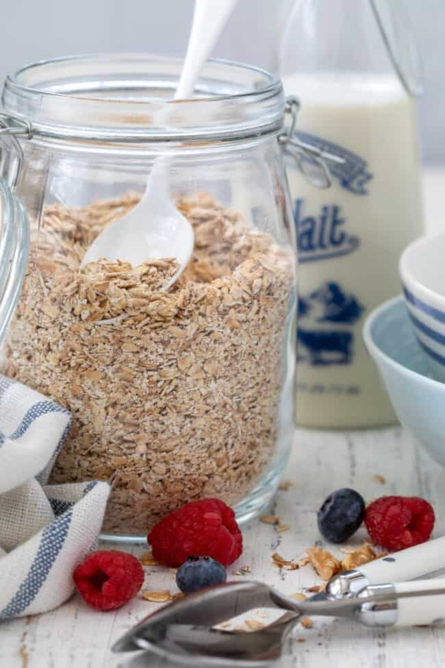 A clear glass mason jar filled with homemade instant oatmeal.