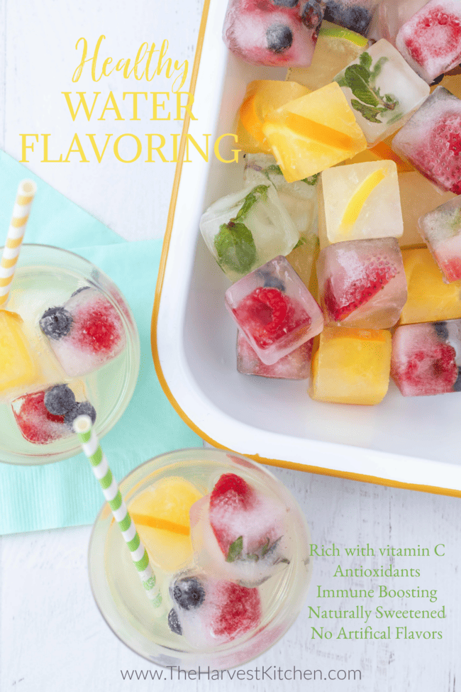 A tray ice cubes made with water and berries.