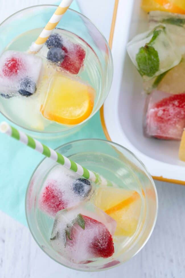 glasses of healthy water flavoring made of fruit ice cubes
