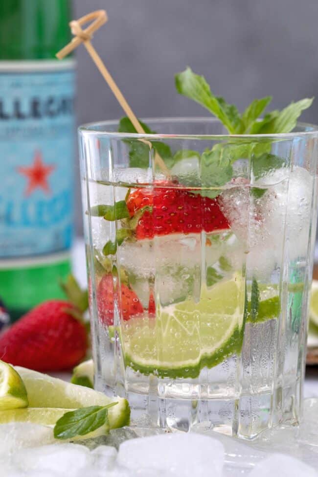 A clear drinking glass filled with sparkling water for seltzer vs sparkling water.