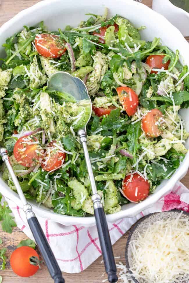 A bowl of basil pesto chicken salad.