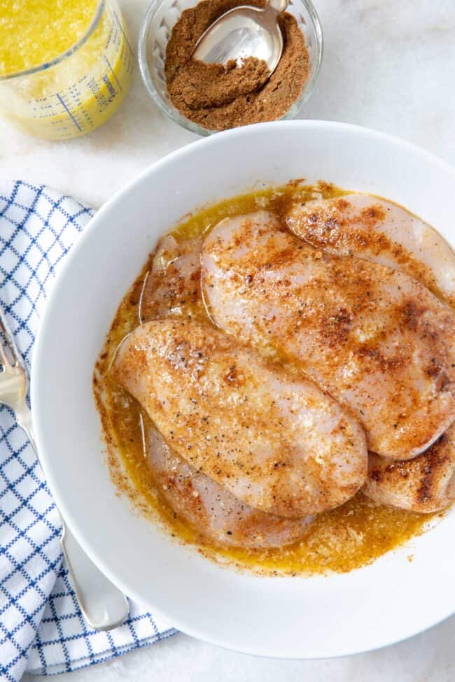 bowl of marinated chicken for best grilled chicken