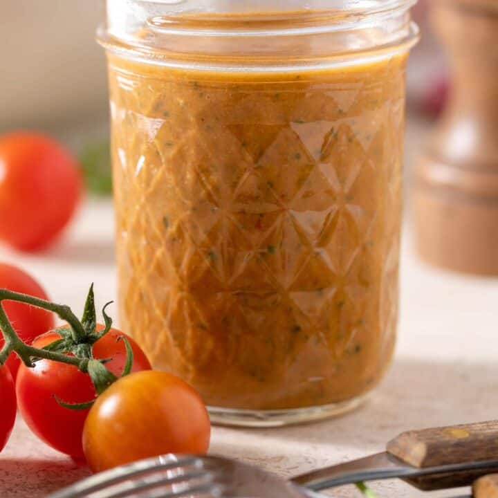 mason jar filled with tomato salad dressing