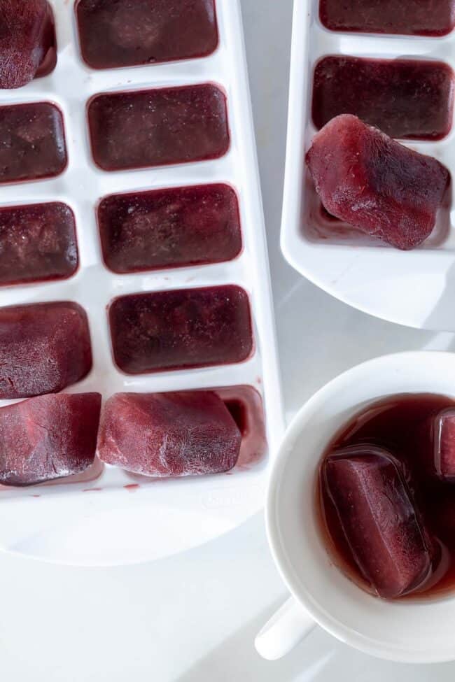 A white tray filled with frozen juice.