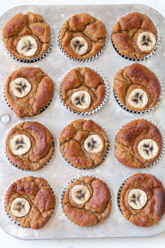 Muffin tin filled with gluten free banana muffins.