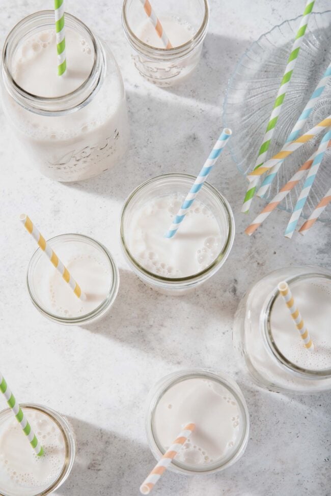 mason jars filled with almond milk to measure qt to oz