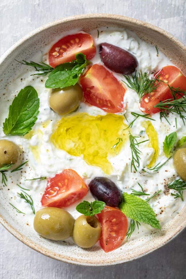 bowl filled with tzatziki sauce for learning how to make tzatziki