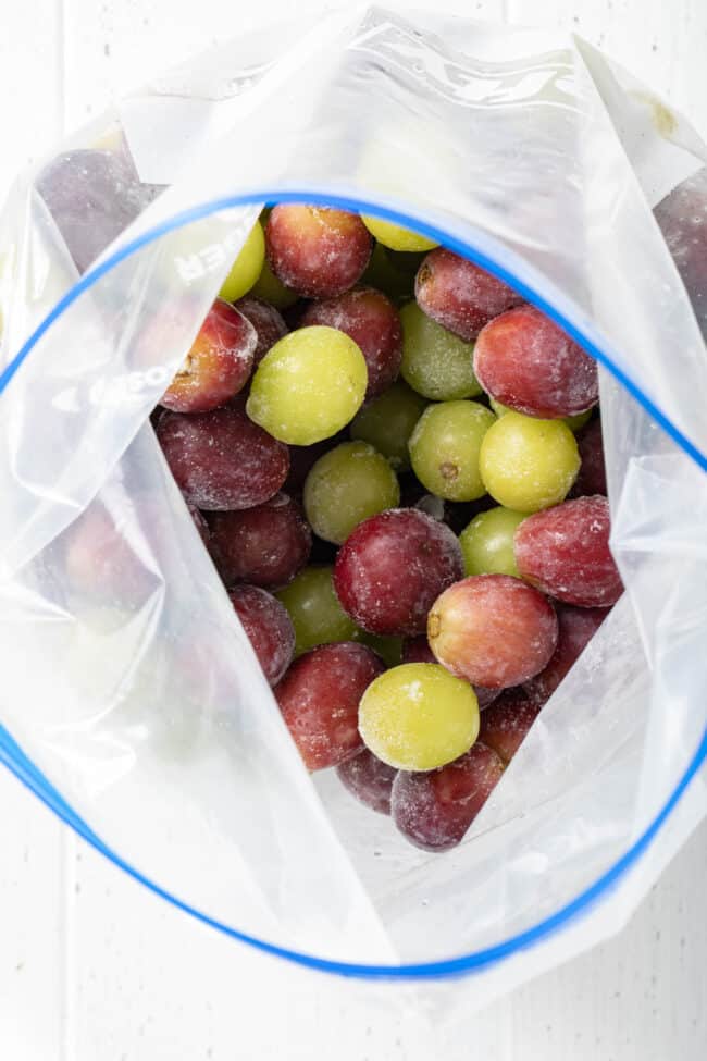 Frozen grapes in a freezer bag for frozen grapes recipe