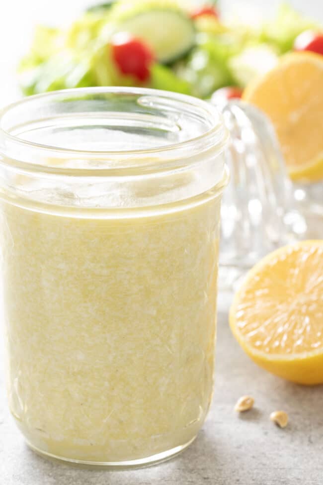 A mason jar filled with creamy Gorgonzola dressing.