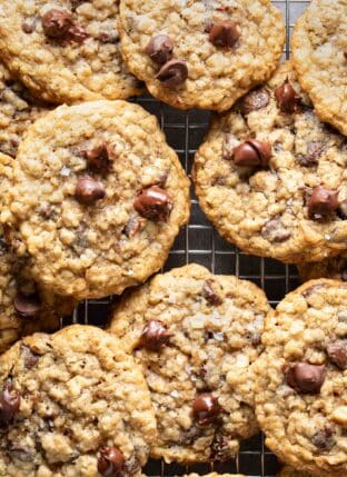 Several Oatmeal Chocolate Chip Cookies on a cooling rack.