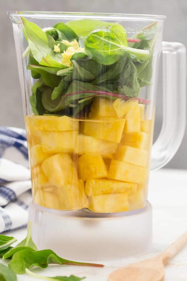 This refreshing Pineapple Detox Water is loaded with pineapple, ginger, baby kale and water.  Drinking pineapple water provides detoxifying, immune-boosting and anti-inflammatory benefits.