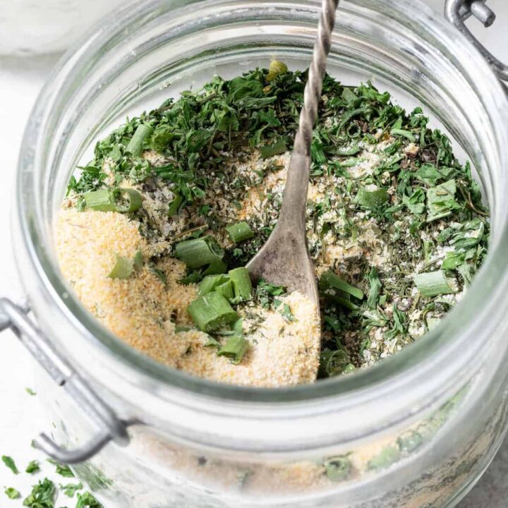 A clear glass mason jar filled with Ranch Salad Dressing Seasoning.