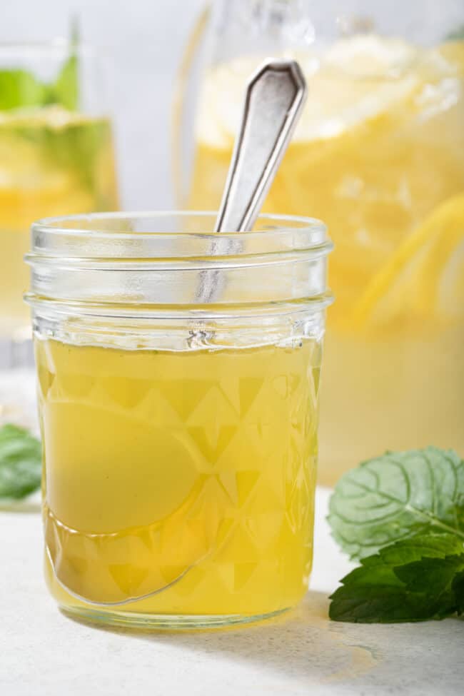 A mason jar filled with simple mint syrup